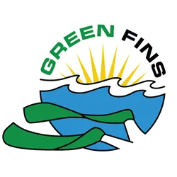 Circular logo showing yellow sun rays above blue stylized waves, green scuba fins in the foreground and the words "GREEN FINS" curved at the top